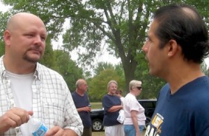 Hickey and Phil Sanchez trade words at the Labor Day picnic in 2012.