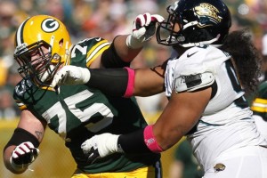 The Green Bay Packers' Bryan Bulaga blocks the Jacksonville Jaguars' Tyson Alualu during the third quarter at Lambeau Field in Green Bay, Wisconsin, Sunday, October 28, 2012. The Packers beat the Jaguars, 25-15. 