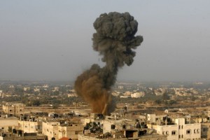 Smoke rises after an Israeli airstrike Monday, November 19, 2012, in Rafah in southern Gaza Strip.