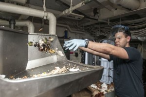 Aviation Ordnanceman Airman Chris Lewis sorts food trash in the pulping room aboard the amphibious assault ship USS Peleliu (LHA 5). Peleliu is the flagship for the Peleliu Amphibious Ready Group and, with the embarked 15th Marine Expeditionary Unit, is deployed in support of maritime security operations and theatre security cooperation efforts in the U.S. 5th Fleet area of responsibility. (U.S. Navy photo by Mass Communication Specialist 3rd Class Van’t Leven)