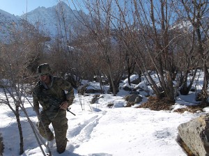 A 2nd Armored Brigade Combat Security Team soldier patrols with the province of Daykudi, Afghanistan while U.S. leader meet with local Afghan leaders and assesses infrastructure projects Dec 30. – Jan. 7.