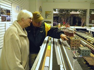 Mr. and Mrs. Jesse Pate checking out the North Iowa Model Railroad at Southbridge Mall