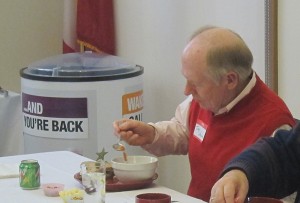 Cerro Gordo County Supervisor Jay Urdahl sampling his soup from another free lunch.  North Iowa has treated Jay Urdahl very, very well.