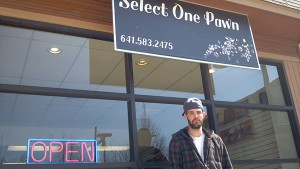 Tyler Fites in front of his store, Select One Pawn, on Thursday afternoon, April 4th, 2013.