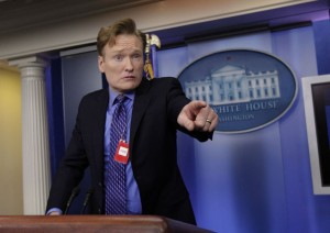 Television host Conan O'Brien poses for photographs while on a tour of the media work area at The White House in Washington, DC on April 26, 2013, the day before he will be the featured entertainment at the White House Correspondents' Association annual dinner.  UPI/Chris Kleponis/Pool