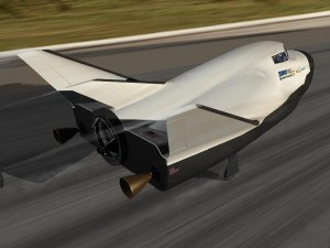 This is an artist's concept of Sierra Nevada Corp.'s Dream Chaser spacecraft landing on a traditional runway. Dream Chaser and its integrated United Launch Alliance (ULA) Atlas V rocket are being developed in collaboration with NASA's Commercial Crew Program during the Commercial Crew Integrated Capability initiative. Image credit: Sierra Nevada Corp.