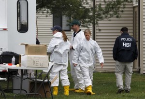 Federal investigators search the apartment of Dias Kadyrbayev and Azamat Tazhayako (off camera left) in New Bedford, Massachusetts on April 19, 2013.  The two were arrested for their alleged involvement with Boston Marathon bombing suspect Dzhokhar Tsarnaev.   UPI/Matthew Healey
