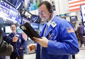 A Trader works on the floor of the NYSE after the closing bell on Wall Street In New York City on May 7, 2013. The Dow Jones Industrial Average closed above 15,000 for the first time in history.   UPI/John Angelillo