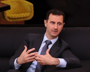 A handout photo distributed by Syrian News Agency (SANA) on July 3, 2012, shows Syria's President Bashar al-Assad during an interview with a Turkish newspaper in Damascus. UPI