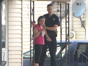 Amber Ward being questioned before being arrested.