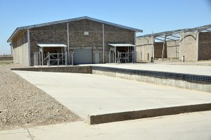 In keeping with its commitment to address some of Afghanistan’s most pressing infrastructure needs, the U.S. Army Corps of Engineers completed the Gereshk Storage and Distribution Center in Helmand province in July, a cold and dry storage facility designed to store, process and transport produce. (Courtesy photo). 