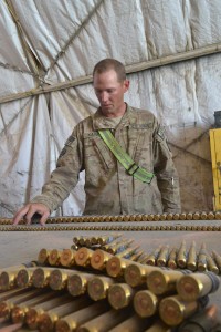 Spc. Kyle Kaiser, an ammunition specialist assigned to 63rd Ordnance Company, Task Force Provider inventories 7.6-mm rounds, July 5. Kaiser, a Tacoma, Wash., native, works at the ammunition supply point at Kandahar Airfield, Afghanistan. (U.S. Army photo by Spc. Rochelle Krueger, 3rd Sustainment Brigade Public Affairs)
