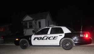 Mason City police parked a few doors down from 308 21st SE in the early morning hours of July 9th, 2013.