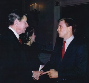 Todd Blodgett, right, shakes the hand of former President Ronald Reagan