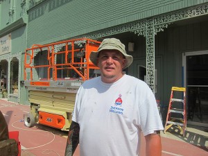 Blake Cooper, owner of DC Professional Painting & Staining, Inc., on the plaza