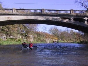 Fall canoeing offers great scenery, cooler weather, and few bugs (Shellrock River, Rock Falls Bridge).