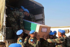 The remains of two UN peacekeepers from the Indian Battalion, killed in action on 19 December 2013 in Akobo Town, Jonglei State, South Sudan, arriving in Juba for a memorial ceremony. UN Photo/Rolla Hinedi