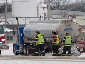 CL fire fighters checking semi that was hauling gas