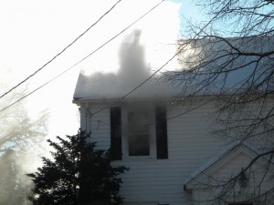 More and more smoke coming out of upstairs front window