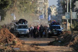 UN vehicles lead the evacuation from the Old City of Homs, Syria, during a three-day "humanitarian pause" in early February 2014. Photo: Syrian Arab Red Crescent (SARC)/B. AlHafez