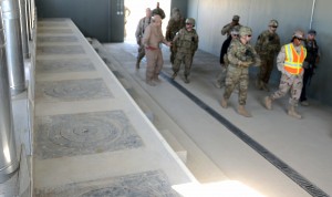 U.S. Army Corps of Engineers, Transatlantic Division Commander Maj. Gen. Michael Eyre and Corps officials walk past wood burning cooking stoves in an Afghan National Army dining facility at a newly-built installation which according to Maj. Gen. Michael Eyre is some of the best construction he's seen in Afghanistan. The Afghan National Army's 215th Combat Logistics Brigade will soon call these Camp Shorabak facilities home. (U.S. Army Corps of Engineers photo by Bill Dowell/released)