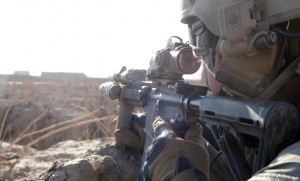 A coalition Special Operation Forces soldier engages anti-Afghan forces