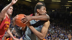MANHATTAN, KS - MARCH 01:  Guard Shane Southwell #1 of the Kansas State Wildcats gets fouled by forward Melvin Ejim #3 of the Iowa State Cyclones during the second half on March 1, 2014 at Bramlage Coliseum in Manhattan, Kansas.  (Photo by Peter G. Aiken)