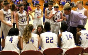 NIACC during a timeout against Dakota College (Photo from niacctrojans.com)