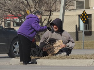 Large homeless man gets an earful from elderly woman on Staruday at about 12:30 PM near 4th SW and Briarstone.
