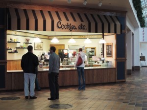 Patrons grab a few more cookies from the soon-to-be-closed Cookies, Etc. store in Southbridge Mall