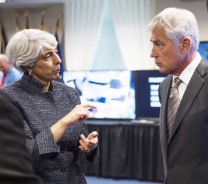 Arati Prabhakar, director of the Defense Advanced Research Projects Agency, briefs Defense Secretary Chuck Hagel on the Atlas robot and other robotics at the Pentagon, April 22, 2014. The program showcased DARPA technologies and how they contribute to U.S. national security. DOD photo by Marine Corps Sgt. Aaron Hostutler  