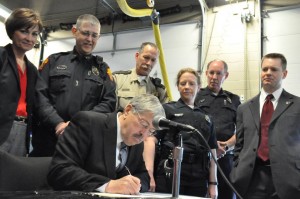 Governor Branstad signs the bill into law.
