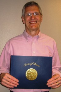 Stu Vold of Mason City received a Governor’s Volunteer Award at a ceremony Monday in Cedar Falls for his service as a Reading Buddy at Roosevelt Elementary School in Mason City. (Photo from NIACC.edu)