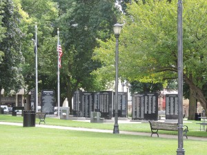 At Vietnam War memorial, at 1:30 PM, the flag flies at full-mast.