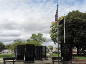 At Vietnam War memorial, at 1:30 PM, the flag flies at full-mast.
