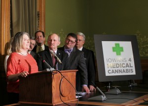 Karrie Anderson, a wife and mother from Grimes, Iowa, told a statehouse news conference Tuesday that she wants to able to use medical cannabis to treat the multiple sclerosis which has dramatically changed her life. Anderson spoke at the unveiling of legislation which would bring comprehensive medical cannabis reform to Iowa, giving Iowans the same access to medicine as the majority of other Americans.  From left to right: Anderson, Senator Tom Courtney of Burlington, Representative Bob Kressig of Cedar Falls, Senator Bill Dotzler of Waterloo, Senator Steve Sodders of State Center, and Representative John Forbes of Urbandale.