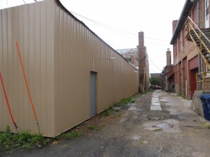 Alley behind the building, leading to Delaware Avenue