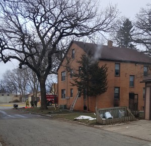 Smoke pours from second floor of Marinos apartment house