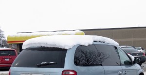 An example of snow piled on the roof of a vehicle 