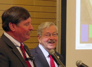 Dr. Ron Prestage with Governor Terry Branstad on March 21, when a whole lot of congratulatory backslaps where handed out in the Historic Park Inn Hotel ballroom over this development that never came to be.