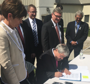 Twitter photo of Branstad in Newton, Iowa signing a renewable fuels bill in May, 2016