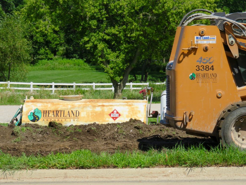 Heartland scrapes the boulevard for new trail, July 18, 2016
