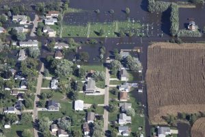 An aerial view from a UH-60 Blackhawk helicopter shows flooding around Cedar Rapids, Iowa, Sept. 26, 2016, following heavy rains that forced thousands of residents from their homes. Members of the Iowa National Guard flew officials around the area to help determine how to proceed. Iowa National Guard photo by Air Force Tech. Sgt. Linda K. Burger 