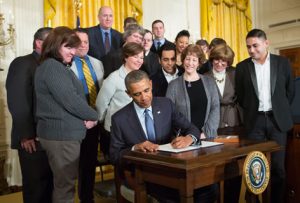 President Obama signs the overtime rule into law