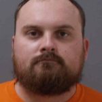 Shotgun murder of sleeping Iowa man now snares another suspect