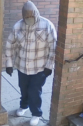 Peek-a-boo: Antoinne E. Davis, 42, of Davenport sees you.